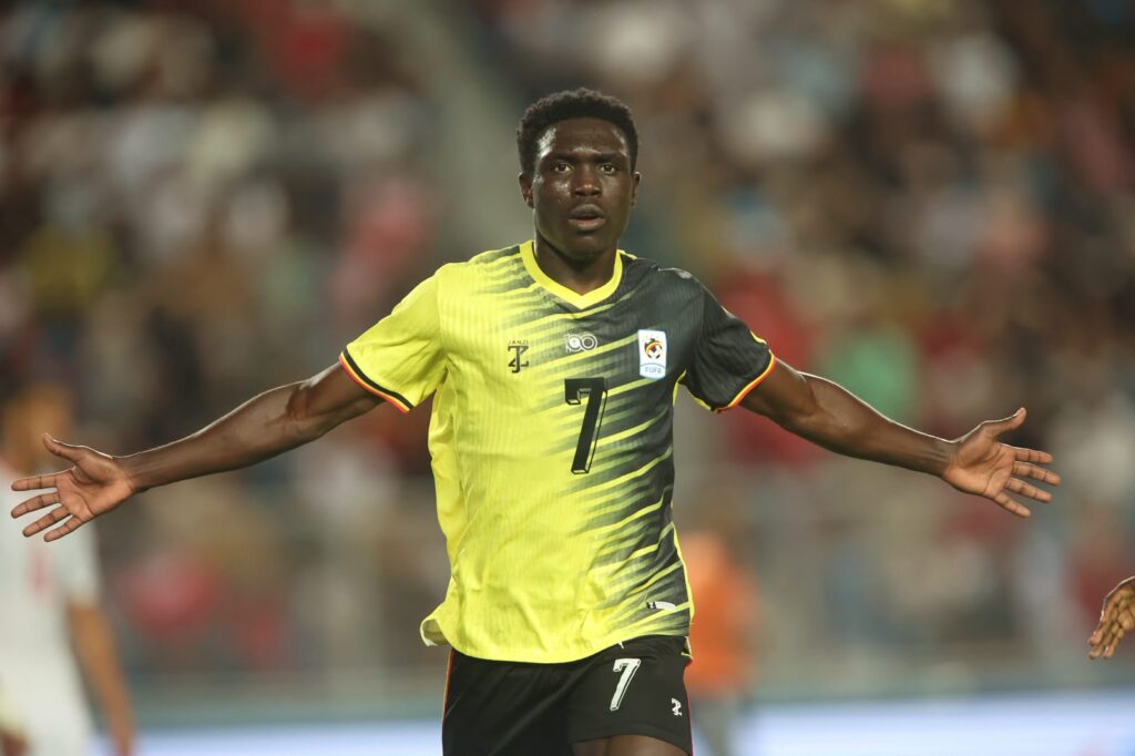 Rogers Mato celebrates after Uganda Cranes earned a historic 1-1 draw against Tunisia in Radès.