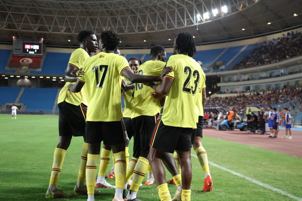 Uganda Cranes players celebrate Rogers Mato’s equaliser against Tunisia in the AFCON 2027 qualifiers