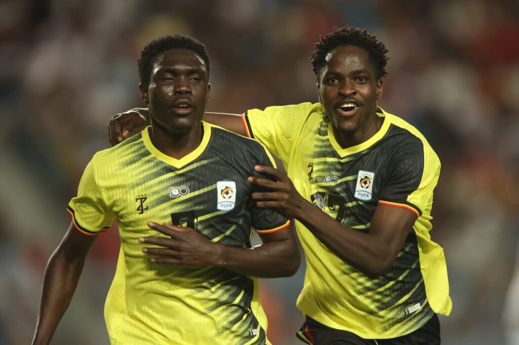 Rogers Mato celebrates after scoring for Uganda against Tunisia ahead of the Libya qualifier in Hoima