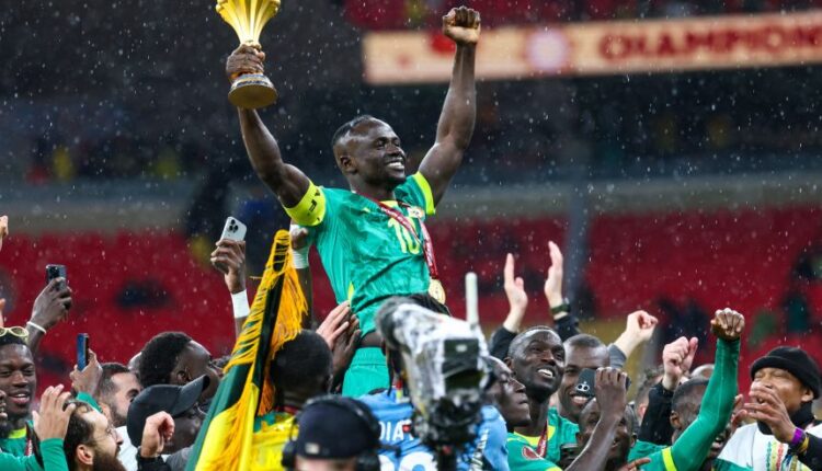 Match this to the photograph used. For a news graphic: “Senegal-Morocco AFCON 2025 title dispute graphic announcing the October 8 CAS hearing.”