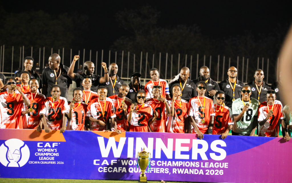 Kawempe Muslim players and officials celebrate winning the 2026 CAF Women's Champions League CECAFA qualifiers in Rwanda.