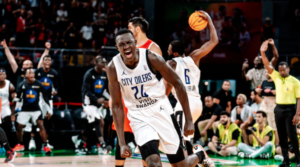 Khaman Maluach celebrates while playing for City Oilers during the 2024 Basketball Africa League.